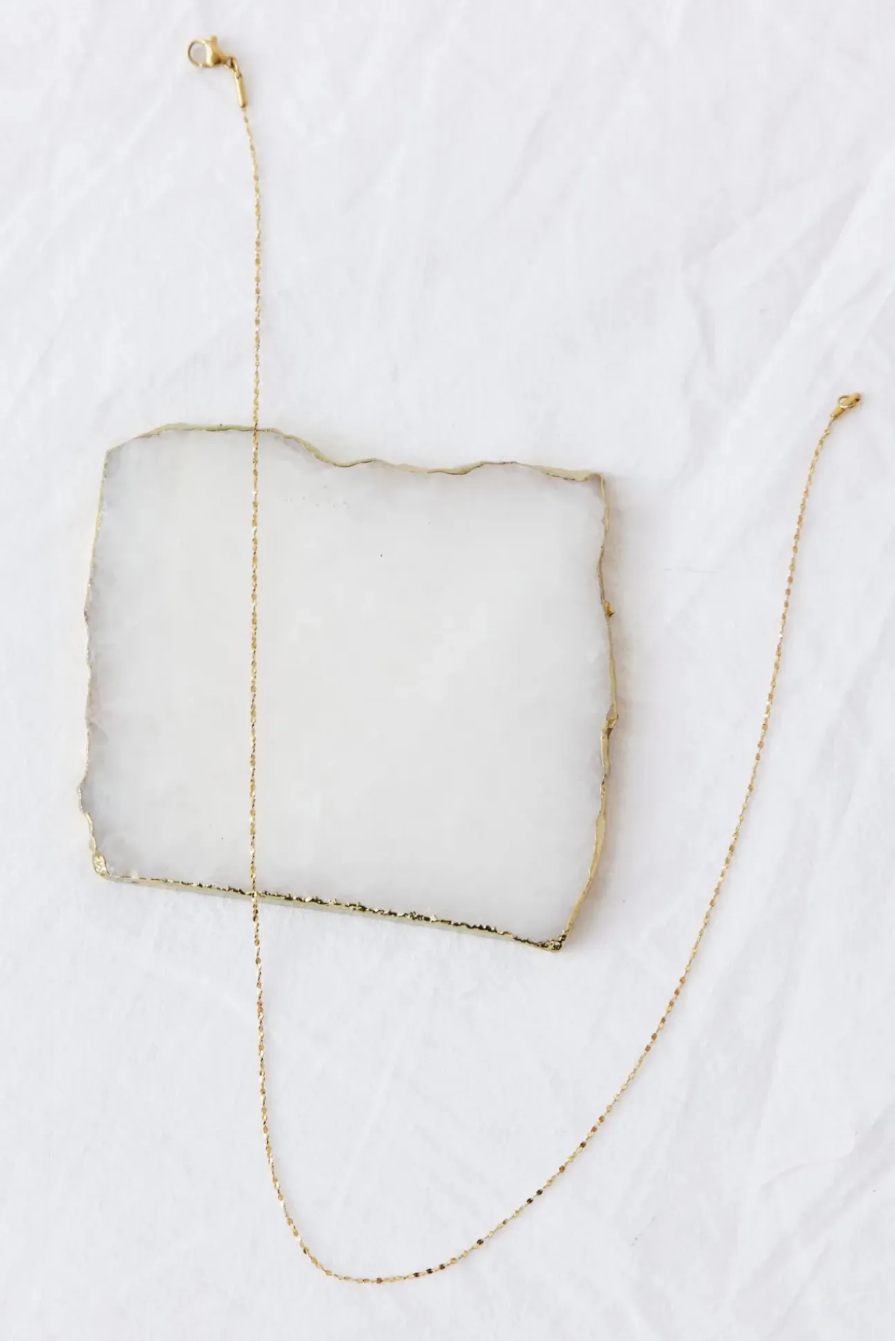 Exit Stage Left Necklace Gold