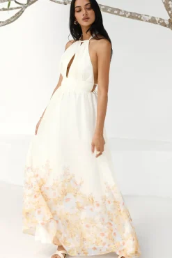 The Meadow’s Secret Halter Maxi Dress Yellow